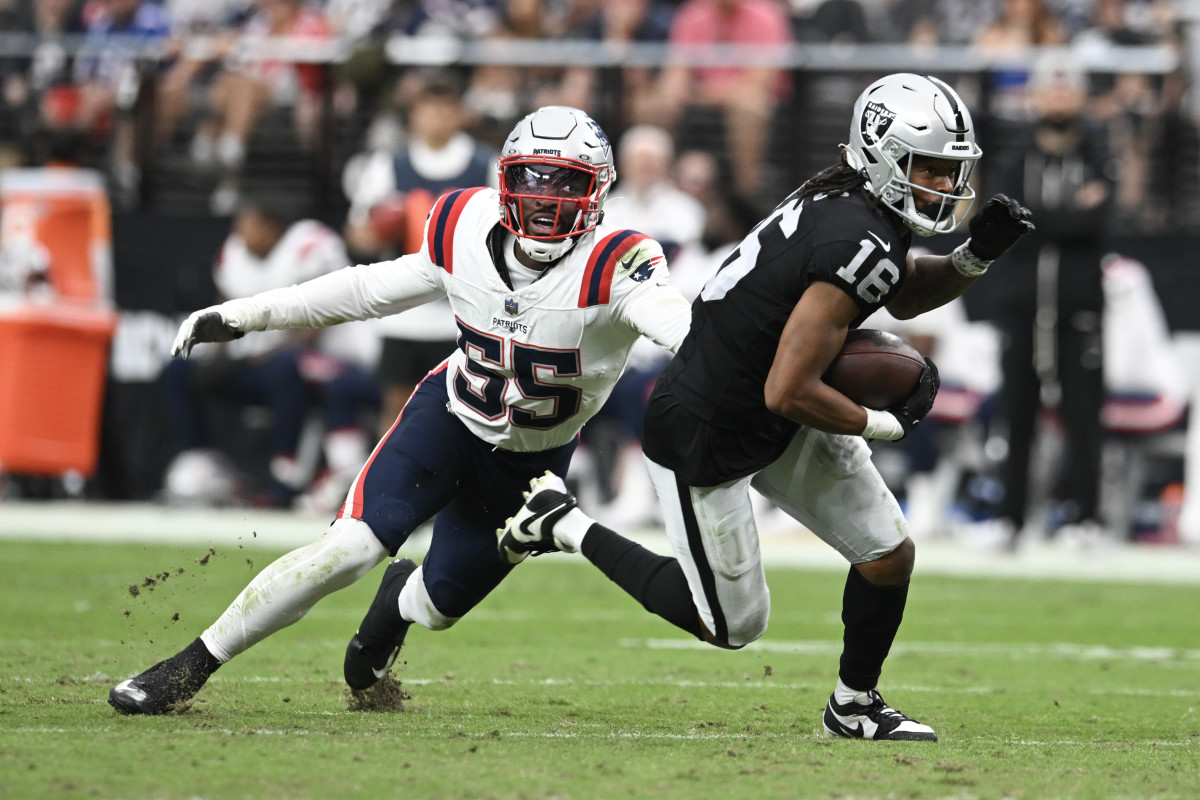 Oct 15, 2023; Paradise, Nevada, USA; New England Patriots linebacker Josh Uche (55) tries to tackle Las Vegas Raiders wide receiver Jakobi Meyers (16) in the second quarter at Allegiant Stadium. 